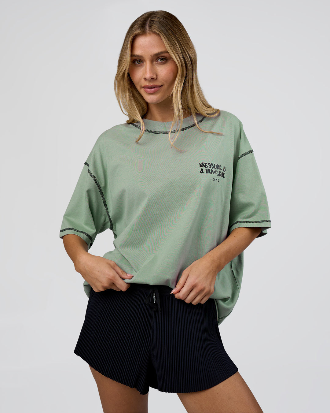 Woman wearing Pressure is Privilege Oversized Tee - Iceberg Green-Black | Model:Leilani | Size:XS - view 5