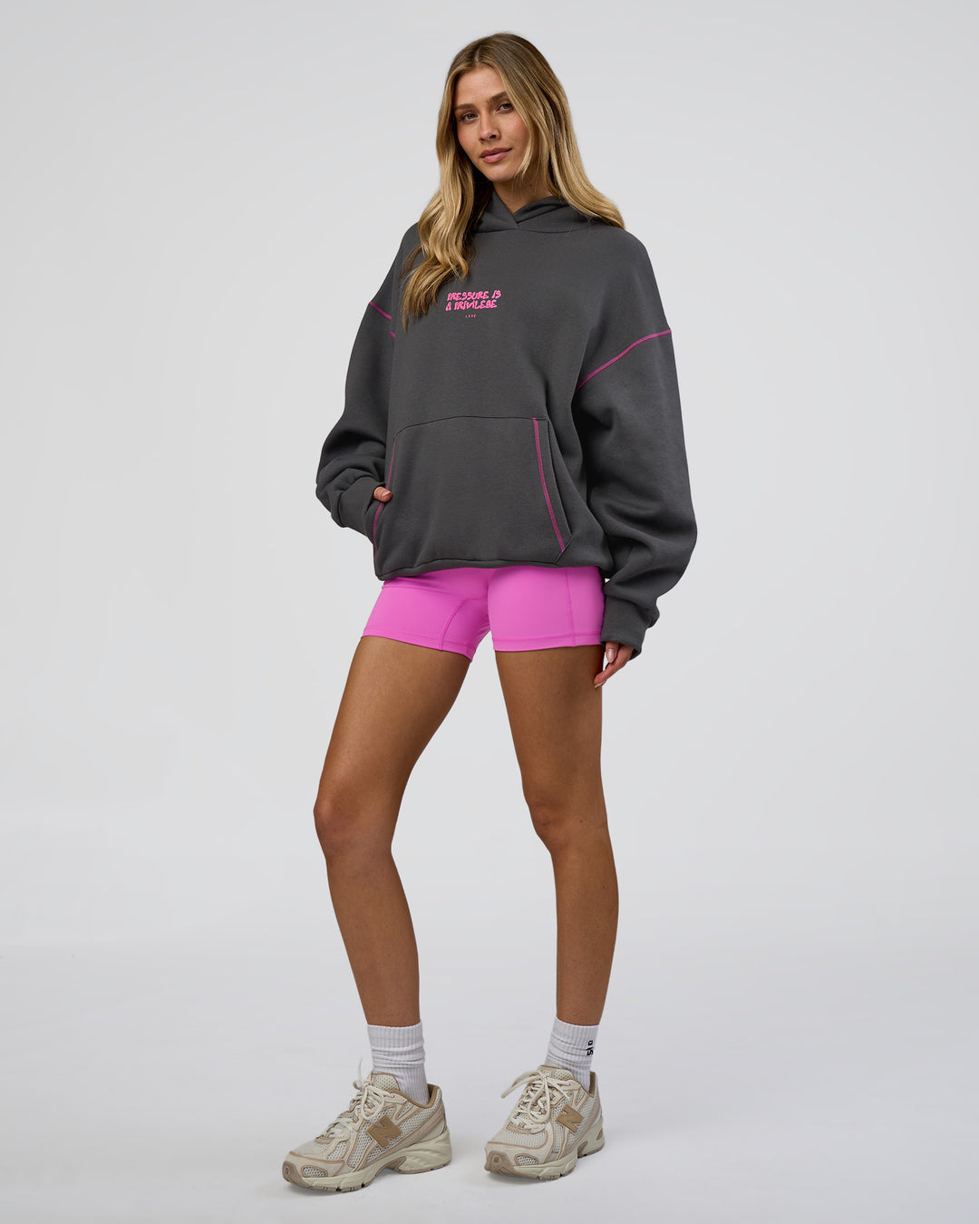 Woman wearing Pressure is Privilege Oversized Hoodie - Dark Storm-Ultra Fuchsia | Model:Leilani | Size:XS - view 7