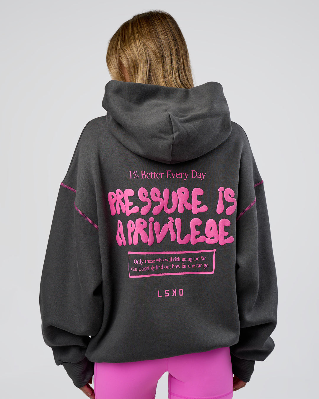 Woman wearing Pressure is Privilege Oversized Hoodie - Dark Storm-Ultra Fuchsia | Model:Leilani | Size:XS - view 4