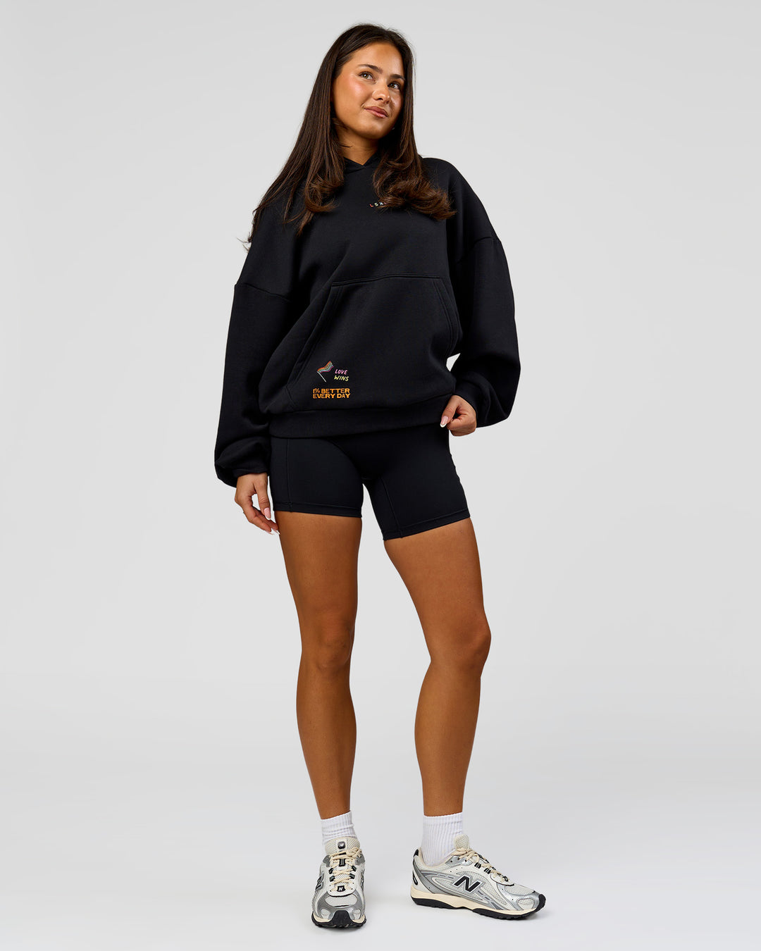 Woman wearing Pride Sticker Boxy Hoodie - Black | Model:Bianca | Size:XS - view 20
