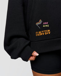 Woman wearing Pride Sticker Boxy Hoodie - Black | Model:Bianca | Size:XS | Thumbnail Index: 10