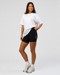 Woman wearing Pride Sticker Boxy Tee - White | Model:Bianca | Size:XS | Thumbnail Index: 14