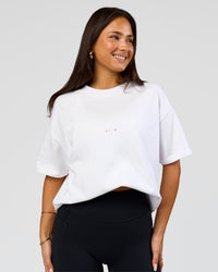 Woman wearing Pride Sticker Boxy Tee - White | Model:Bianca | Size:XS | Thumbnail Index: 17