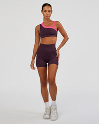 Woman wearing Progression Ultra High-Rise 4" Short - Midnight Plum | Model:Brylee | Size:XS | Thumbnail Index: 4