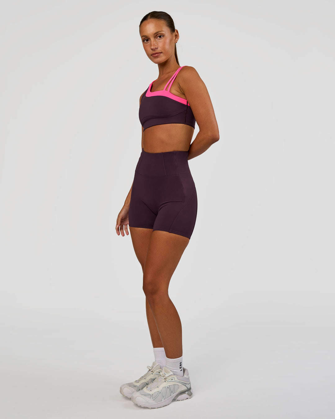 Woman wearing Progression Ultra High-Rise 4" Short - Midnight Plum | Model:Brylee | Size:XS - view 8