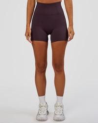 Woman wearing Progression Ultra High-Rise 4" Short - Midnight Plum | Model:Brylee | Size:XS | Thumbnail Index: 3