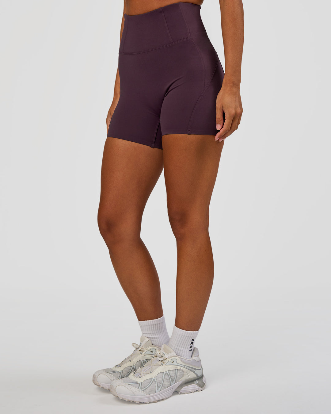 Woman wearing Progression Ultra High-Rise 4" Short - Midnight Plum | Model:Brylee | Size:XS - view 1