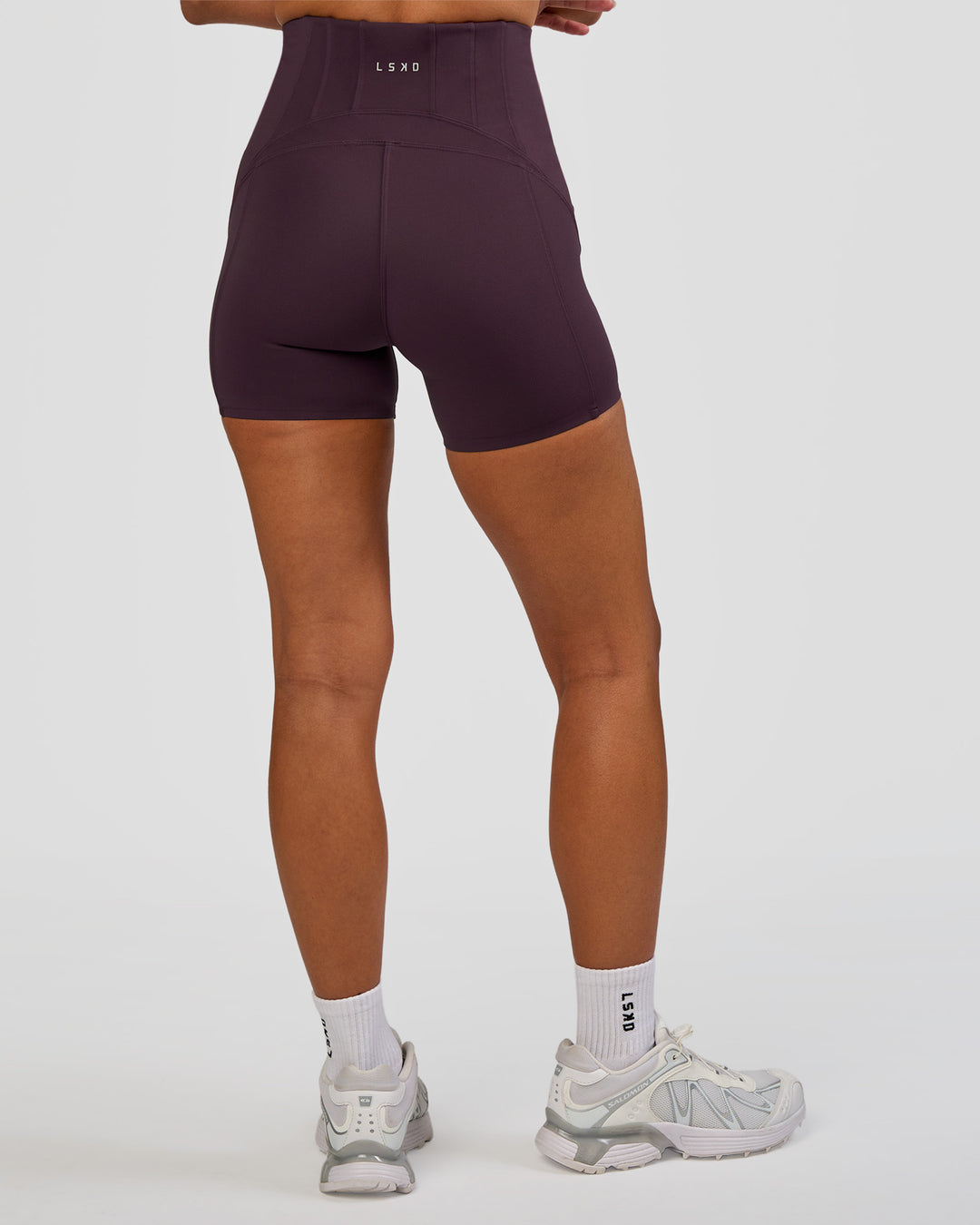 Woman wearing Progression Ultra High-Rise 4" Short - Midnight Plum | Model:Brylee | Size:XS - view 9