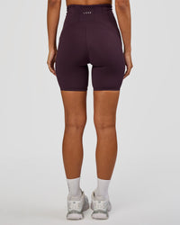 Woman wearing Progression Ultra High-Rise 6" Short - Midnight Plum | Mode:Brylee | Size:XS | Thumbnail Index: 3