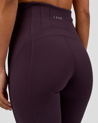 Woman wearing Progression Ultra High-Rise Full Length Legging - Midnight Plum | Model:Brylee | Size:XS | Thumbnail Index: 4