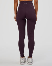 Woman wearing Progression Ultra High-Rise Full Length Legging - Midnight Plum | Model:Brylee | Size:XS | Thumbnail Index: 6