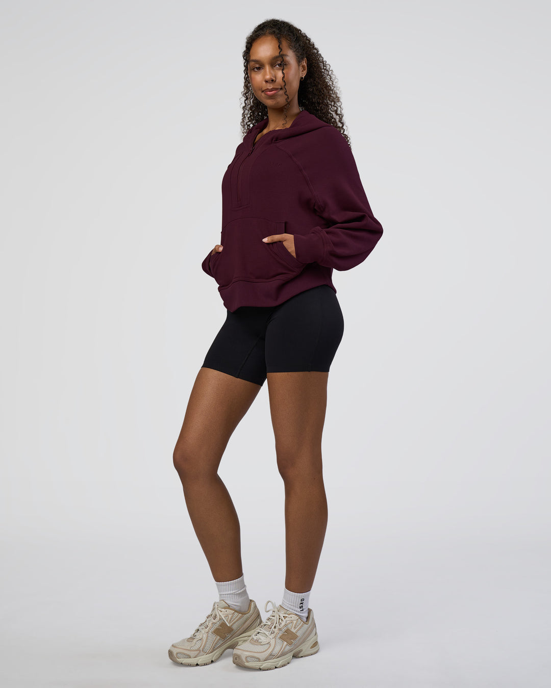 Woman wearing Pursue Mid-Weight Hoodie - Cherry Lacquer | Model:Jordan | Size:XS - view 5