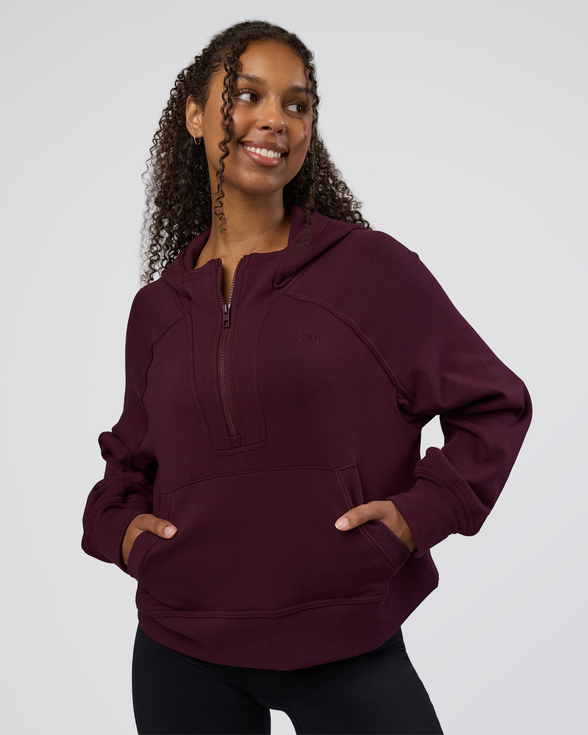 Woman wearing Pursue Mid-Weight Hoodie - Cherry Lacquer | Model:Jordan | Size:XS