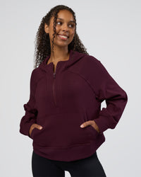 Woman wearing Pursue Mid-Weight Hoodie - Cherry Lacquer | Model:Jordan | Size:XS | Thumbnail Index: 0