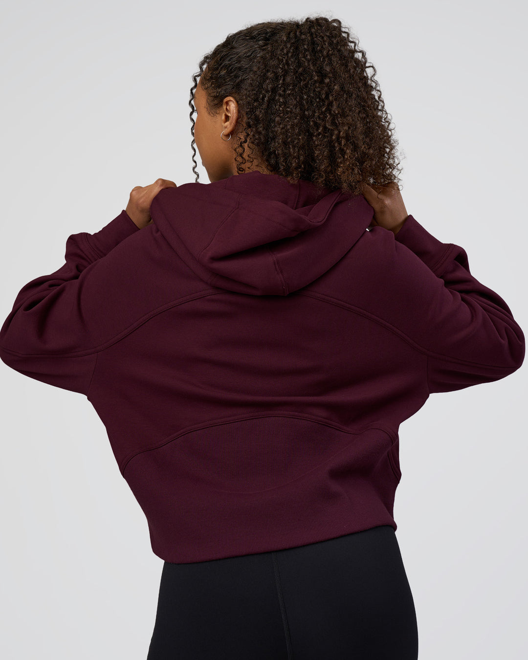 Woman wearing Pursue Mid-Weight Hoodie - Cherry Lacquer | Model:Jordan | Size:XS - view 3