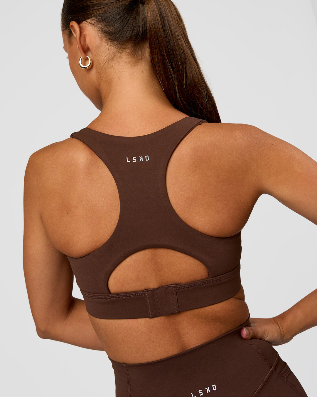 Woman wearing Race Day Sports Bra - Hot Chocolate | Model:Brylee | Size:XS - view 2