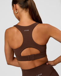 Woman wearing Race Day Sports Bra - Hot Chocolate | Model:Brylee | Size:XS | Thumbnail Index: 1