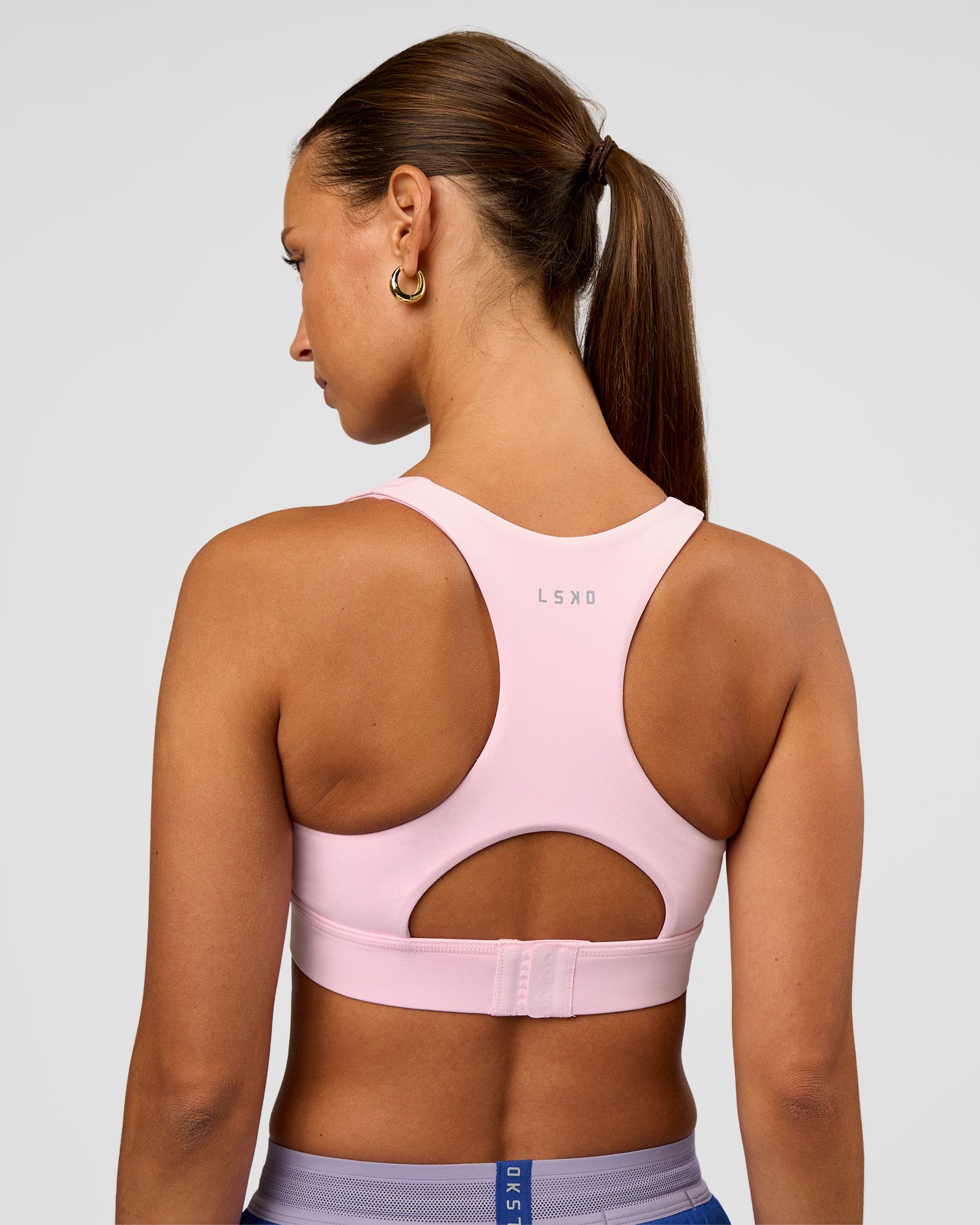 Woman wearing Race Day Sports Bra - Marshmallow | Model:Brylee | Size:XS