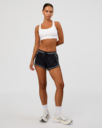 Woman wearing Race Day Sports Bra - White | Model:Brylee | Size:XS | Thumbnail Index: 3