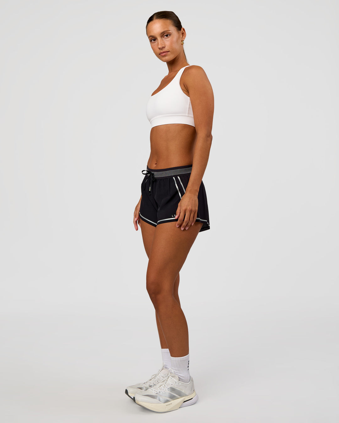 Woman wearing Race Day Sports Bra - White | Model:Brylee | Size:XS - view 6