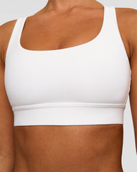 Woman wearing Race Day Sports Bra - White | Model:Brylee | Size:XS | Thumbnail Index: 4