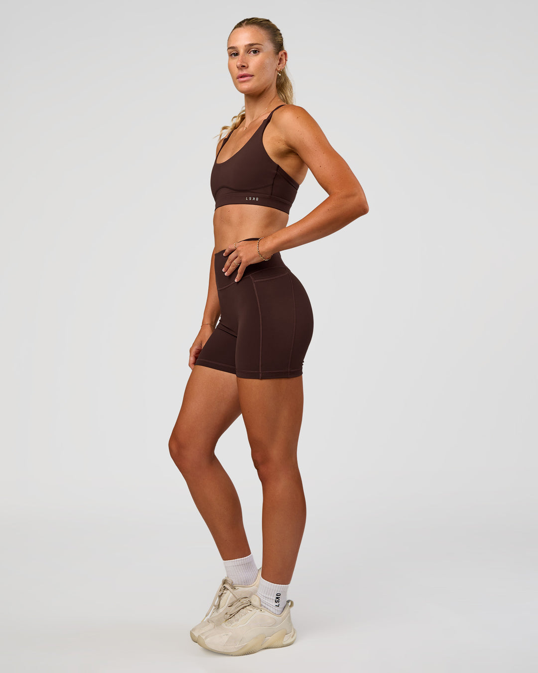 Woman wearing Rapid Sports Bra - Hot Chocolate | Model:Emelia | Size:XS - view 3