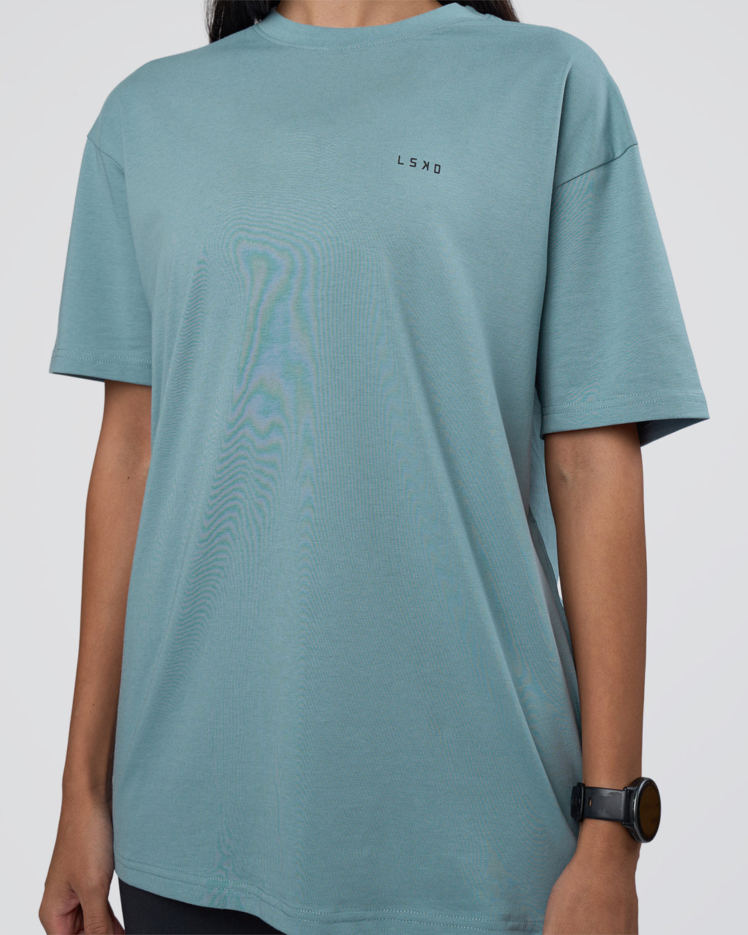 Woman wearing Research Department FLXCotton Oversized Tee - Smoke Blue | Model:Rhiley | Size:XS - view 10