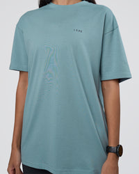 Woman wearing Research Department FLXCotton Oversized Tee - Smoke Blue | Model:Rhiley | Size:XS | Thumbnail Index: 9