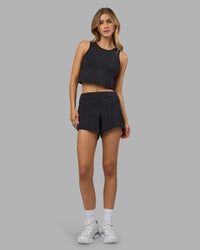 Woman wearing Restore CloudFLX Tank - Black | Model:Leilani | Size:XS | Thumbnail Index: 2
