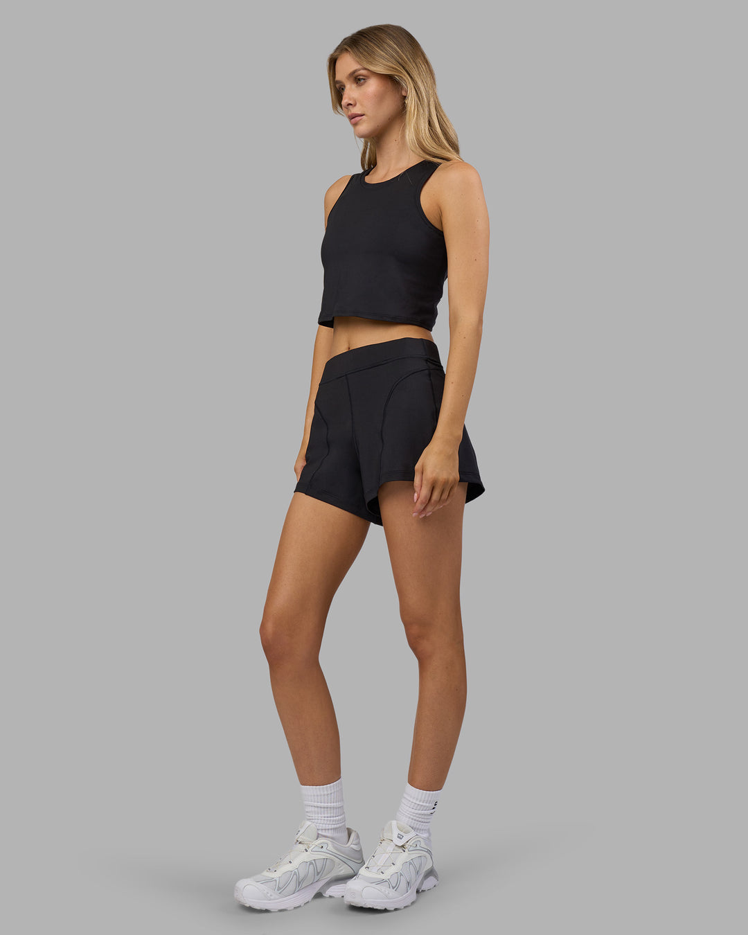 Woman wearing Restore CloudFLX Tank - Black | Model:Leilani | Size:XS - view 5