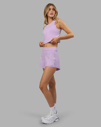 Woman wearing Restore CloudFLX Tank - Orchid Bloom Marl | Model:Leilani | Size:XS | Thumbnail Index: 4