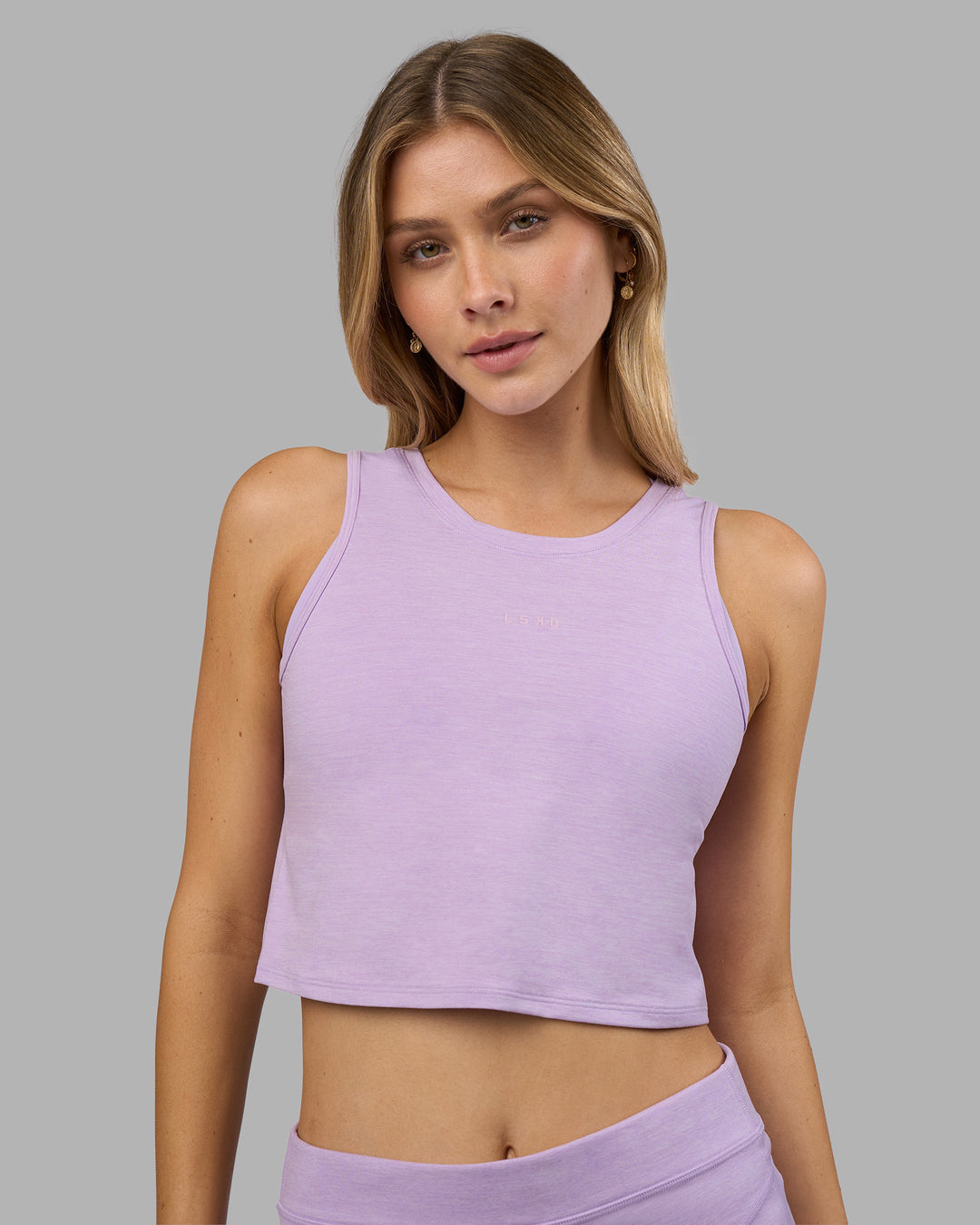 Woman wearing Restore CloudFLX Tank - Orchid Bloom Marl | Model:Leilani | Size:XS - view 3