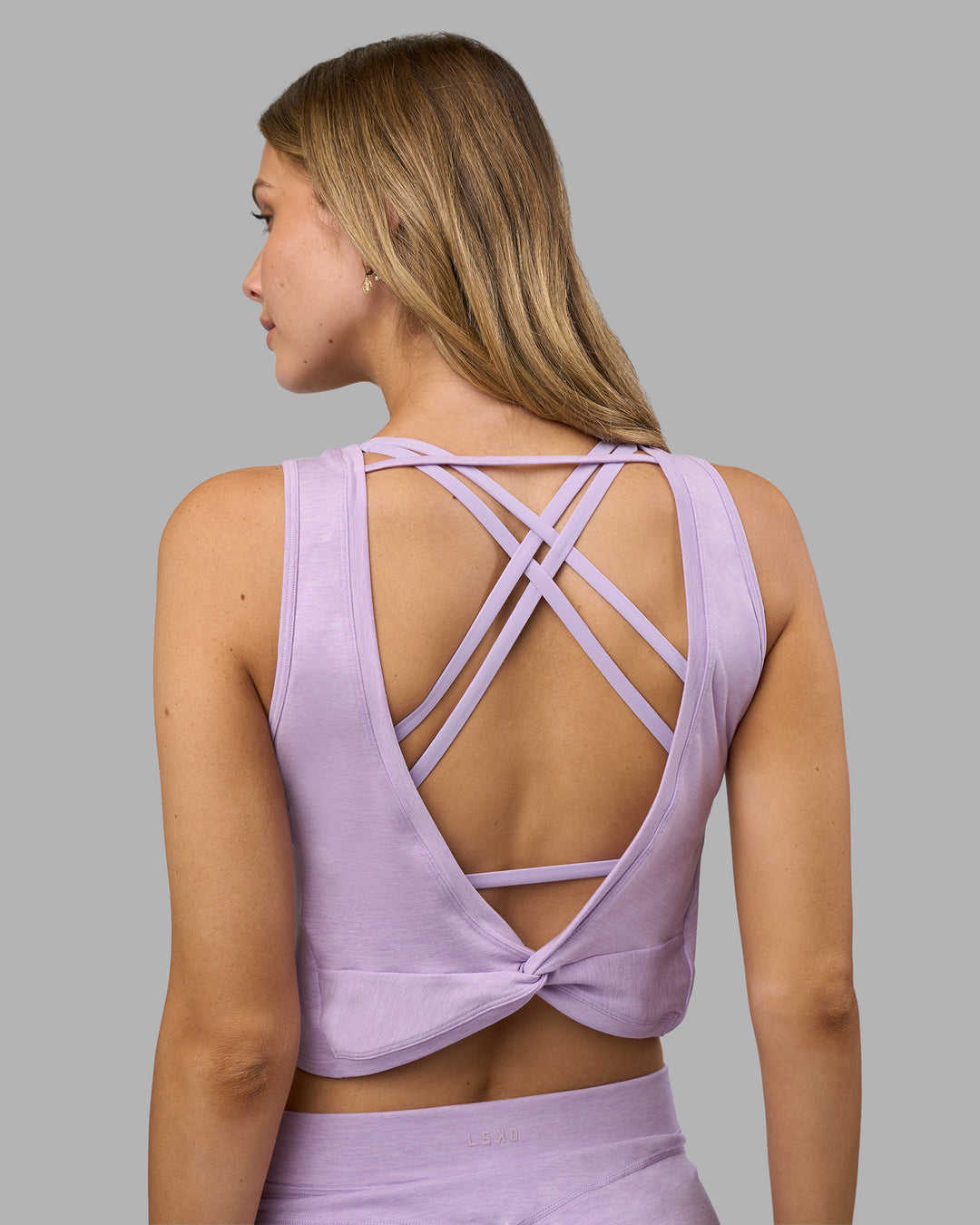 Woman wearing Restore CloudFLX Tank - Orchid Bloom Marl | Model:Leilani | Size:XS - view 2