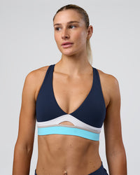 Woman wearing Revitalise Flash Sports Bra - Future Navy-Multi | Model:Emelia | Size:XS | Thumbnail Index: 0
