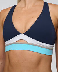 Woman wearing Revitalise Flash Sports Bra - Future Navy-Multi | Model:Emelia | Size:XS | Thumbnail Index: 3