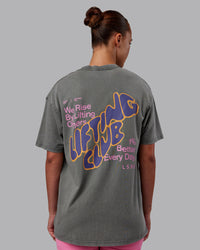 Woman wearing Rise & Lift Washed FLXCotton Oversized Tee - Graphite-Purple Opulence | Model:Charlize | Size:XS | Thumbnail Index: 1