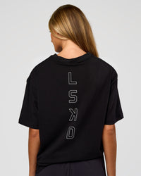 Woman wearing Run Club Script FLXCotton Oversized Tee - Black-Alloy | Model:Georgia | Size:XS | Thumbnail Index: 4