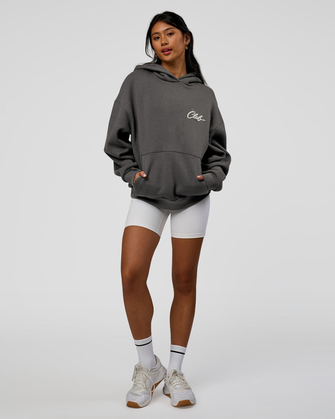 Woman wearing Run Club Script Oversized Hoodie - Dark Storm-Alloy | Model:Loren | Size:XS - view 7