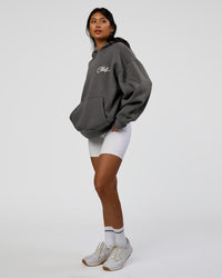 Woman wearing Run Club Script Oversized Hoodie - Dark Storm-Alloy | Model:Loren | Size:XS | Thumbnail Index: 10