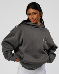 Woman wearing Run Club Script Oversized Hoodie - Dark Storm-Alloy | Model:Loren | Size:XS | Thumbnail Index: 4