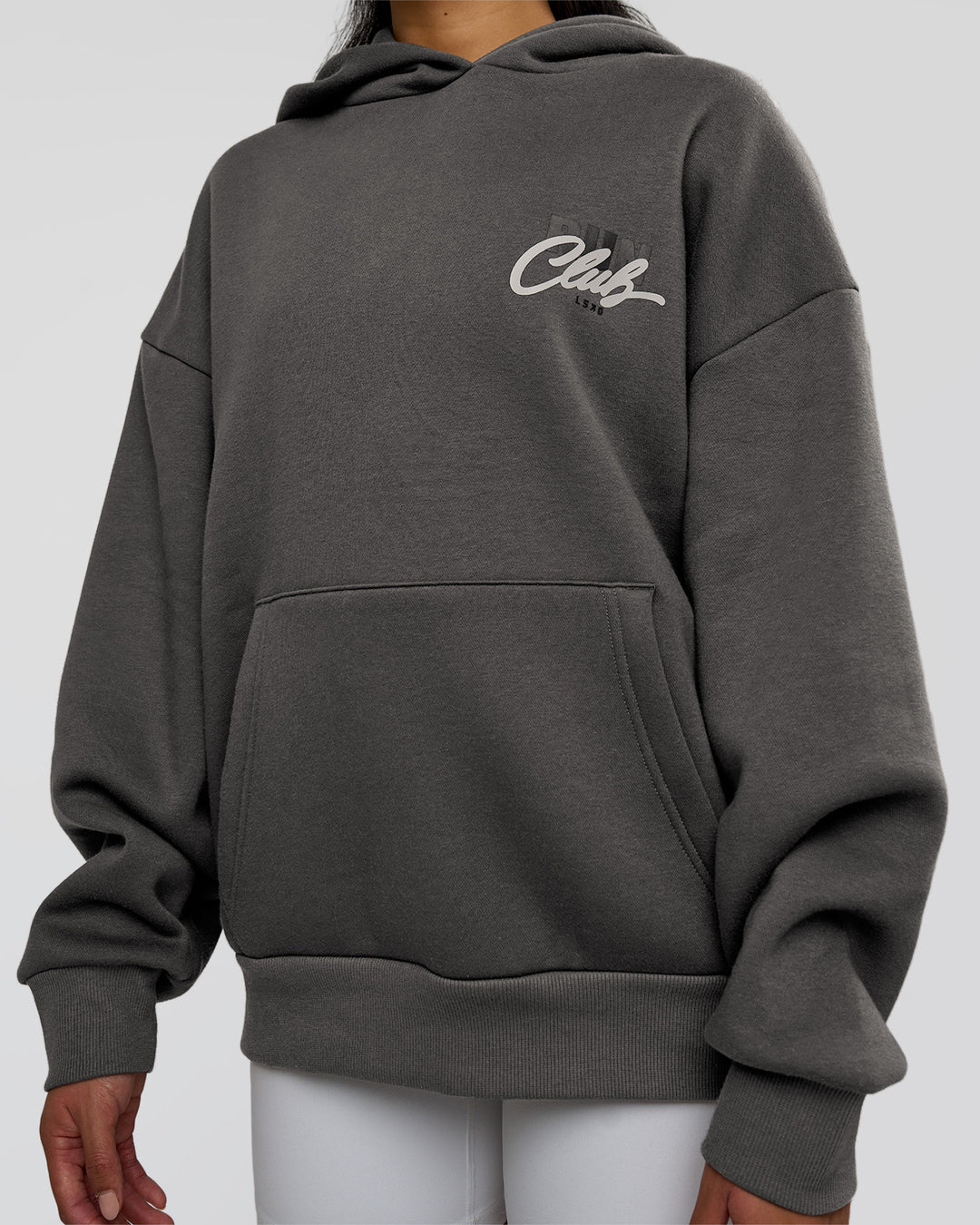 Woman wearing Run Club Script Oversized Hoodie - Dark Storm-Alloy | Model:Loren | Size:XS - view 10