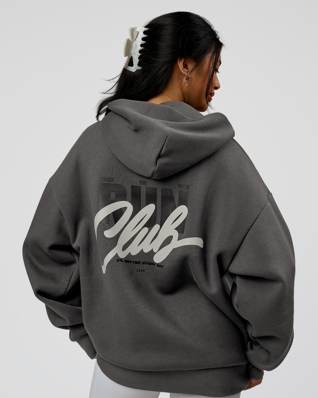 Woman wearing Run Club Script Oversized Hoodie - Dark Storm-Alloy | Model:Loren | Size:XS - view 4
