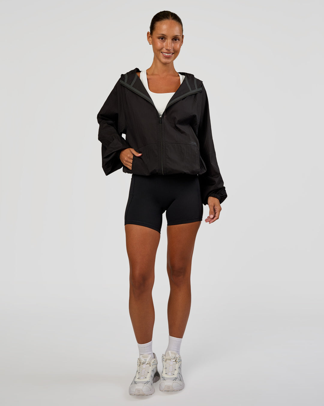 Woman wearing Run Light Jacket - Black | Model:Brylee | Size:XS - view 11