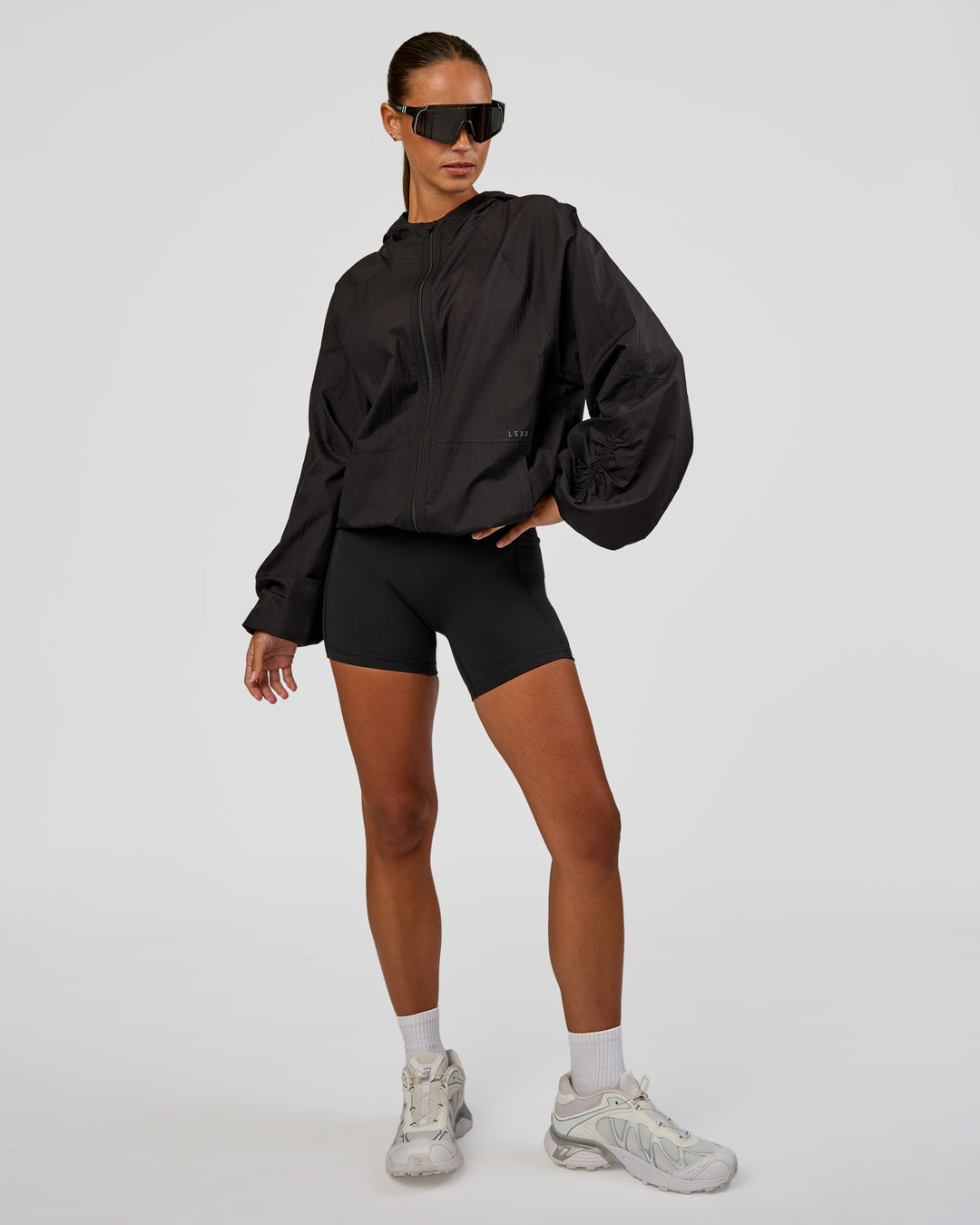 Woman wearing Run Light Jacket - Black | Model:Brylee | Size:XS - view 3