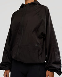 Woman wearing Run Light Jacket - Black | Model:Brylee | Size:XS | Thumbnail Index: 11