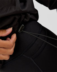 Woman wearing Run Light Jacket - Black | Model:Brylee | Size:XS | Thumbnail Index: 5