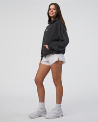 Woman wearing Runner’s Unisex Oversized Hoodie - Black Washed-White | Model:Estella | Size:XS | Thumbnail Index: 9