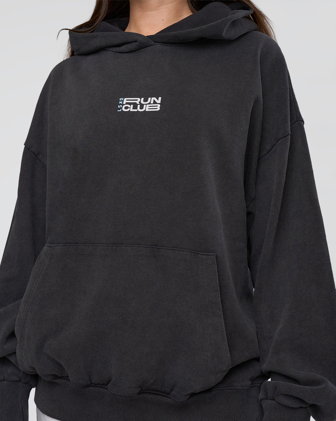 Woman wearing Runner’s Unisex Oversized Hoodie - Black Washed-White | Model:Estella | Size:XS - view 11