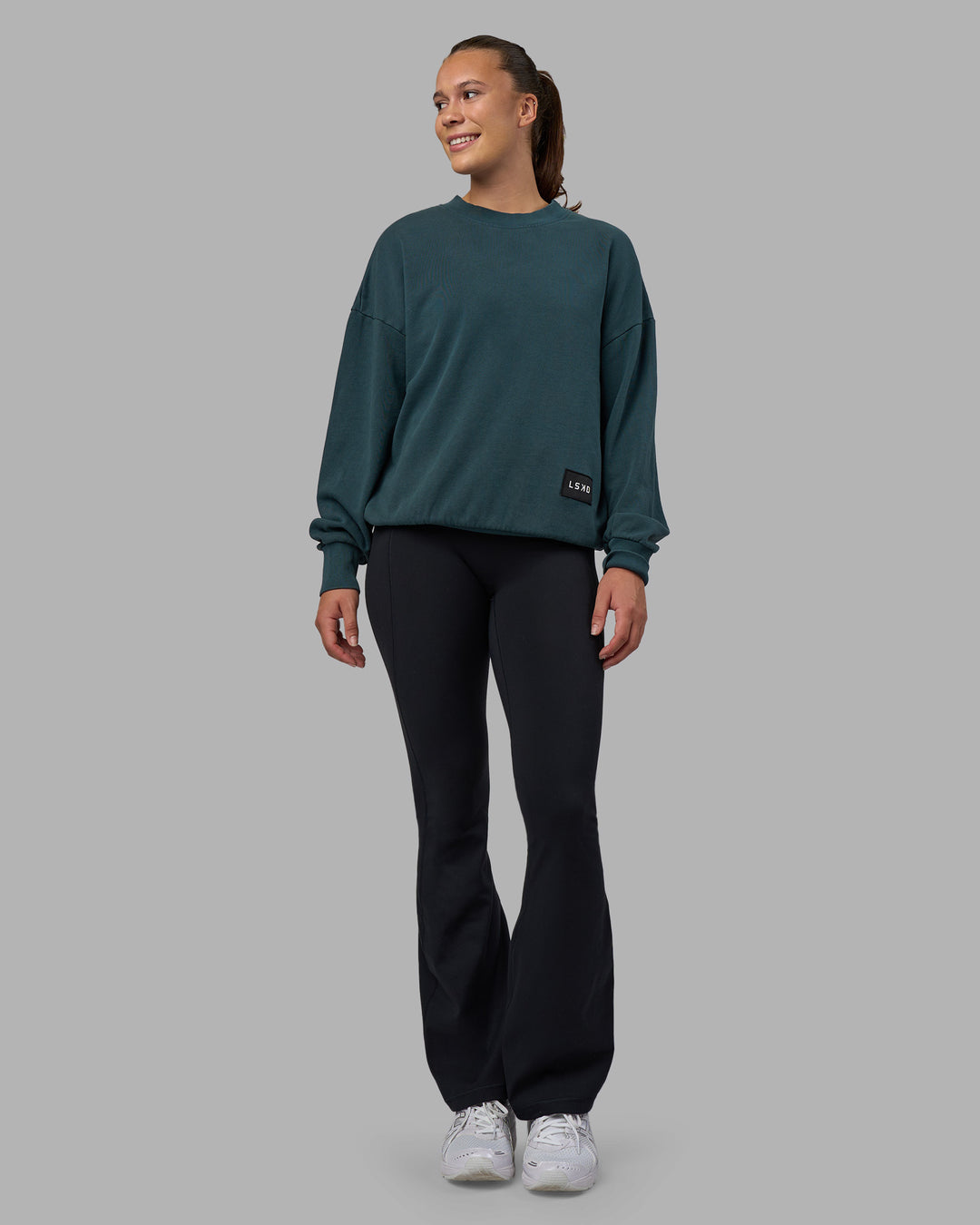 Woman wearing Segmented Oversized Sweater - Abyssal | Model:Charlize | Size:XS - view 3