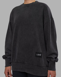 Woman wearing Segmented Oversized Sweater - Black Washed | Model:Charlize | Size:XS | Thumbnail Index: 9